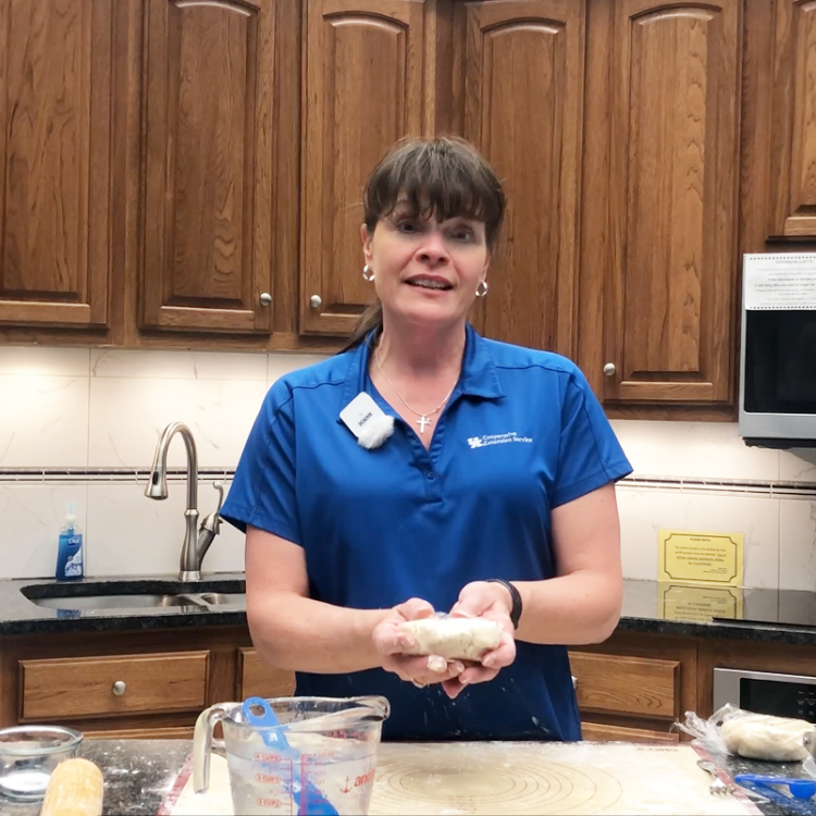 FCS Agent, Joan Bowling is pictured demonstrating how to form a pie crust